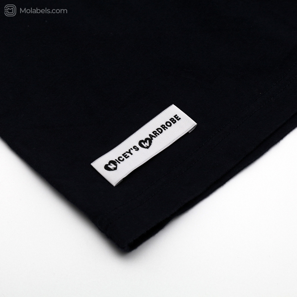 White woven label with black logo