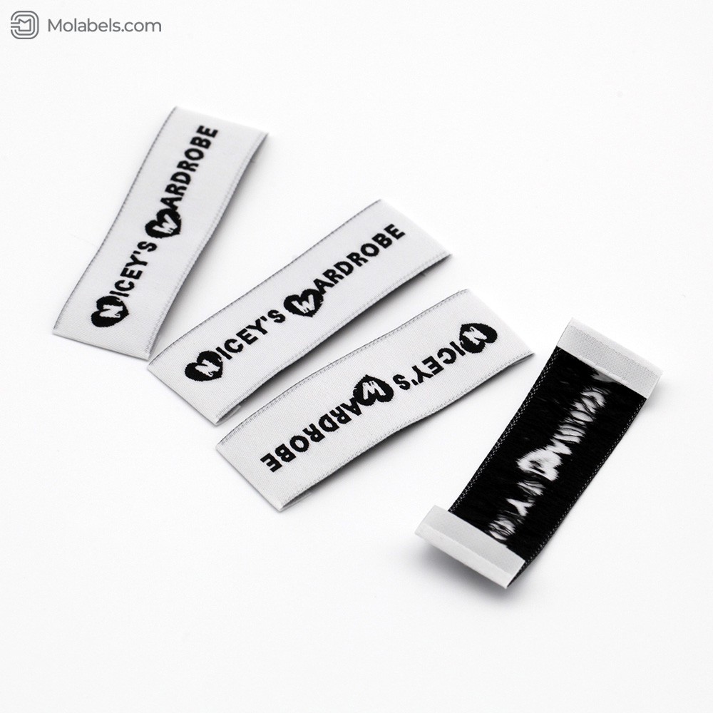 White woven label with black logo