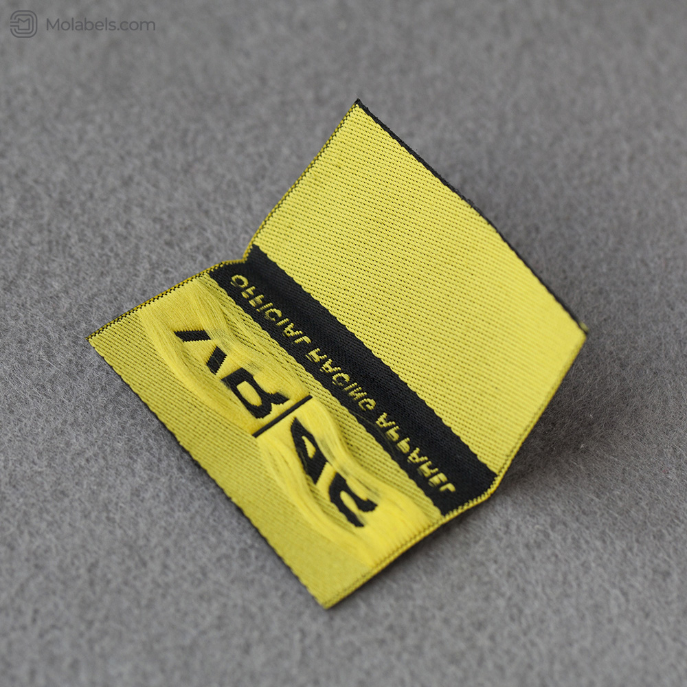 Custom mitre fold woven garment labels